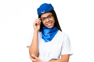Airplane stewardess African american woman over isolated background with glasses and happy
