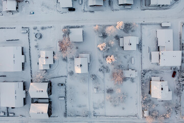 Suburban view from above with small houses and snow in Espoo, Finland