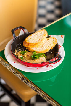 Chicken liver pate with bread and herbs
