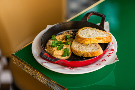 Chicken liver pate with bread and herbs