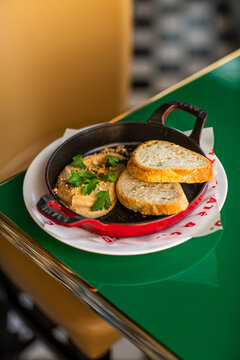 Chicken liver pate with bread and herbs