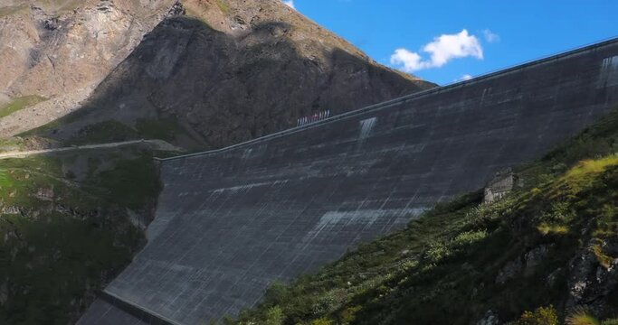 The Grande Dixence Dam in the canton of Valais in Switzerland is a tallest concrete gravity dam in the world and tallest dam in Europe. Cable cabin ride along the dam.