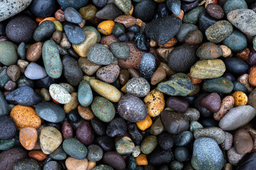 colored stones formed by the waves on the seashore