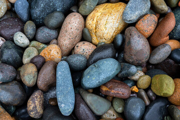 colored stones formed by the waves on the seashore