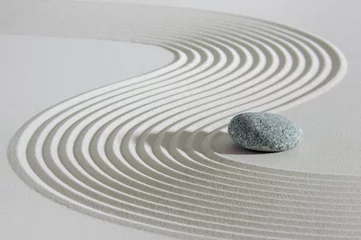 Papier peint photo Beige Japanese Zen garden with stone in textured sand  © Wolfilser