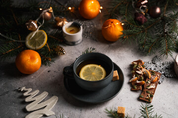tea with lemon in a New Year's atmosphere, holidays, screensaver 