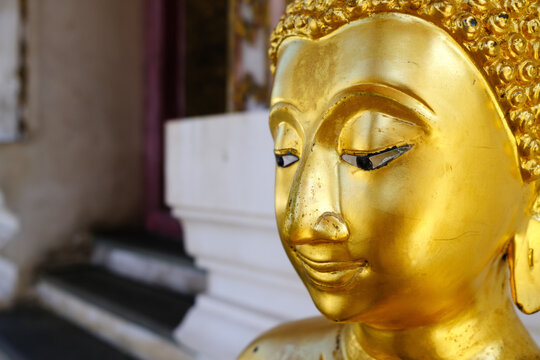Close up Golden Vintage Buddha Image.