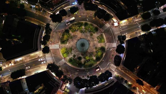 Tel Aviv drone shot. Kikar Dizengoff in Israel night time aerial shot. beautiful roundabout city center in the middle east.
