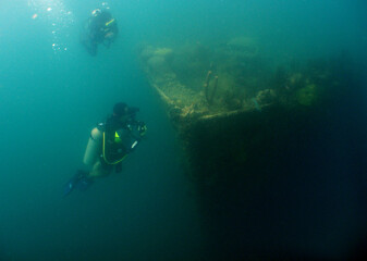 Naklejka na ściany i meble a sunken ship with poor visibility due to high sedimentation