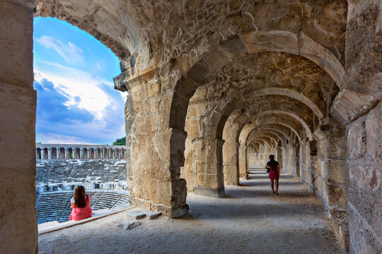Visitors in the Roman Amphitheater of Aspendos in Antalya, Turkey