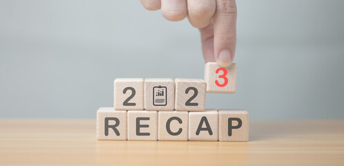 Summary of the economy. Business. Financial concept. Business plan 2023 word RECAP and 2023 on...