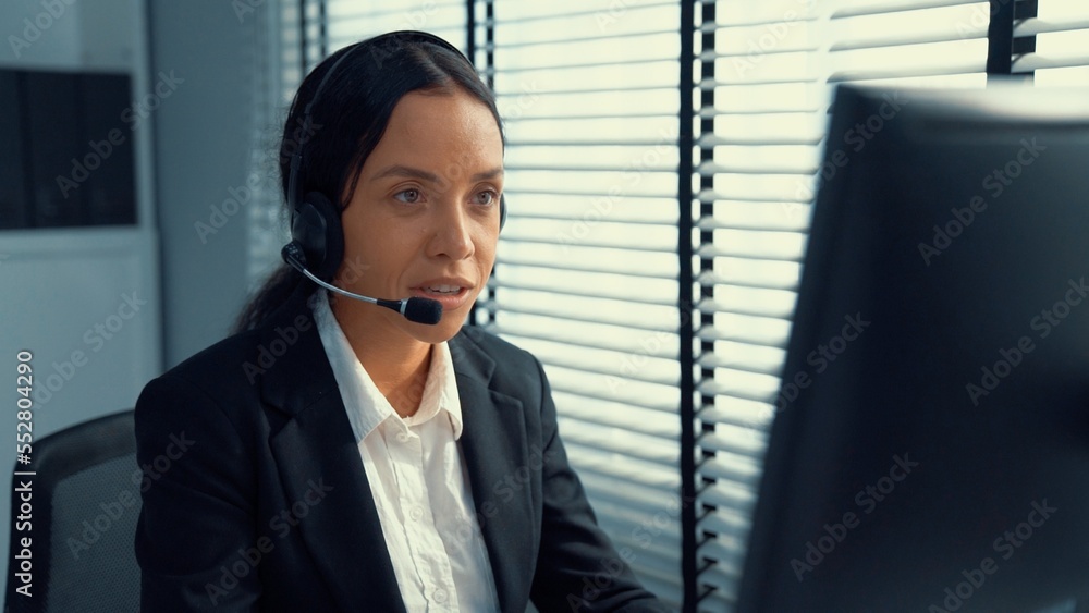 Aufkleber competent female operator working on computer and talking with clients. concept relevant to both cal
