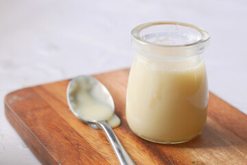 condensed milk in a bowl close up,
