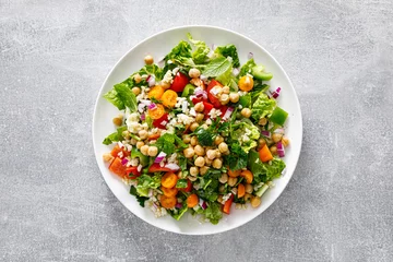 Poster Tabbouleh salad. Tabouli salad with fresh parsley, onions, tomatoes, bulgur and chickpea. Healthy vegetarian food, mediterranean diet. Top view © Sea Wave