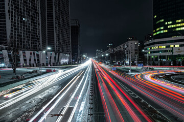 Fototapeta na wymiar Night city highway traffic.
