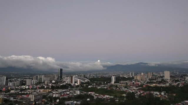 Moonrise Aerial view of La Sabana Park and Costa Rica National Stadium with San Jose, Costa Rica in the background