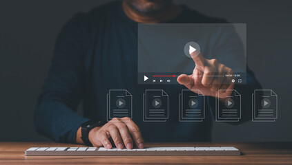 Businessman making video content of business 4.0 in 2024. Man using hand and keyboard for streaming online on virtual screen, watching video on internet, live concert, show or tutorial, content online