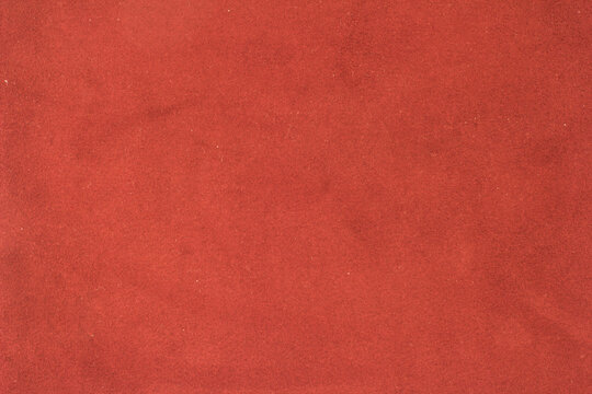 Red elegance leather texture for background with visible details
