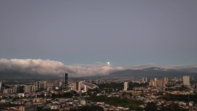 Moonrise Aerial view of La Sabana Park and Costa Rica National Stadium with San Jose, Costa Rica in the background
