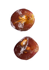 Sliced red grape isolated on white background.