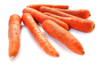 Raw whole carrot. Root vegetable with natural shadow on a white background 