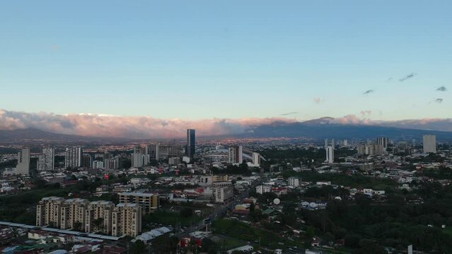 Sunset Aerial view of La Sabana Park and Costa Rica National Stadium with San Jose, Costa Rica in the background