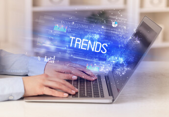 Closeup of businessman hands working on laptop