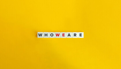 Who We Are Question and Banner. Block Letter Tiles on Yellow Background. Minimal Aesthetics.