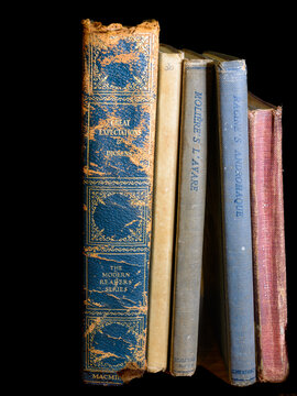 Vintage Copies of Famous Works of English and French Literature on a Black Background on December 8, 2022 in New Orleans, Louisiana, USA