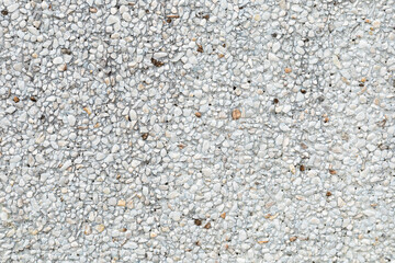 The pattern small bluish white pebbles stone as background. pebbles texture wall and floor.
