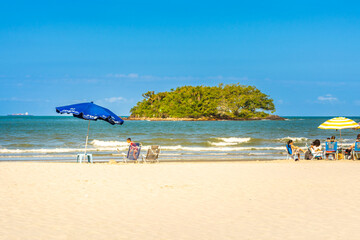 December 06, 2022 - Balneario Camboriu, Santa Catarina, Brazil: 'ilha das cabras', or goat island in english is a small island on the central beach in Balneario Camboriu