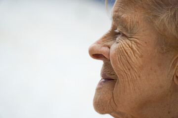 closeup profile portrait of senior lady with copy space. 90s grandmother. Age woman © Sheila