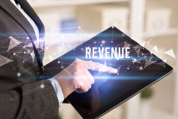 Close up hands using tablet