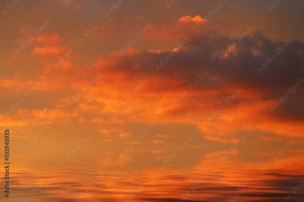 Poster sea water surface with pink clouds at sunset. into a horizontal frame