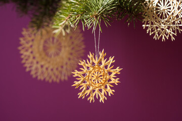 Snowflake are made of straw. Christmas decor. Small depth of field
