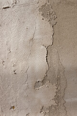 The surface is roughly decorated with cement mortar. Texture. Close-up