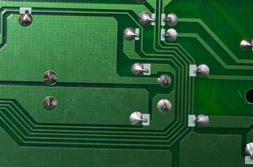 green printed circuit board close-up with smd components