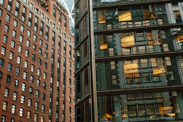 Fototapeta na wymiar Close-up of skyscrapers in the evening in New York City. New York City Architecture
