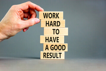Work hard for result symbol. Concept words Work hard to have a good result on wooden blocks on a...