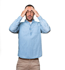 Naklejka premium Concerned young man with a stress gesture