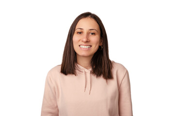 Fototapeta premium Studio portrait of a young woman wearing light pink hoodie and smiling to camera.