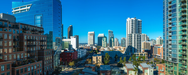 San Diego city skyline, panoramic downtown cityscape of buildings and skyscrapers on a sunny morning with blue sky in Southern California, USA, high view