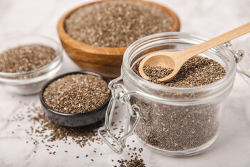 Bowl and spoon with chia seeds, closeup.Superfood. Healthy food. Diet. The concept of proper...