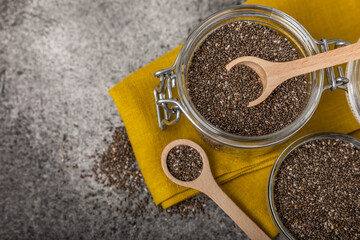 Bowl and spoon with chia seeds, closeup.Superfood. Healthy food. Diet. The concept of proper...