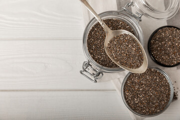 Chia in a spoon and a glass jar close-up.Superfood. Healthy food. Diet. The concept of proper nutrition. antioxidant. Place for text, space for copy.