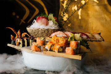 Fototapeta na wymiar large set of sushi with good serving on ice