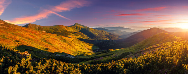 Panorama landscape of Carpathian mountains during sunset. Scenic image of fantastic atmosferic...
