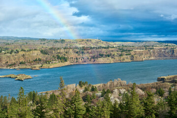 Fototapeta na wymiar Rainbow over the Columbia River Gorge in Oregon.