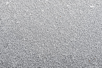 thin layer of snow on glass