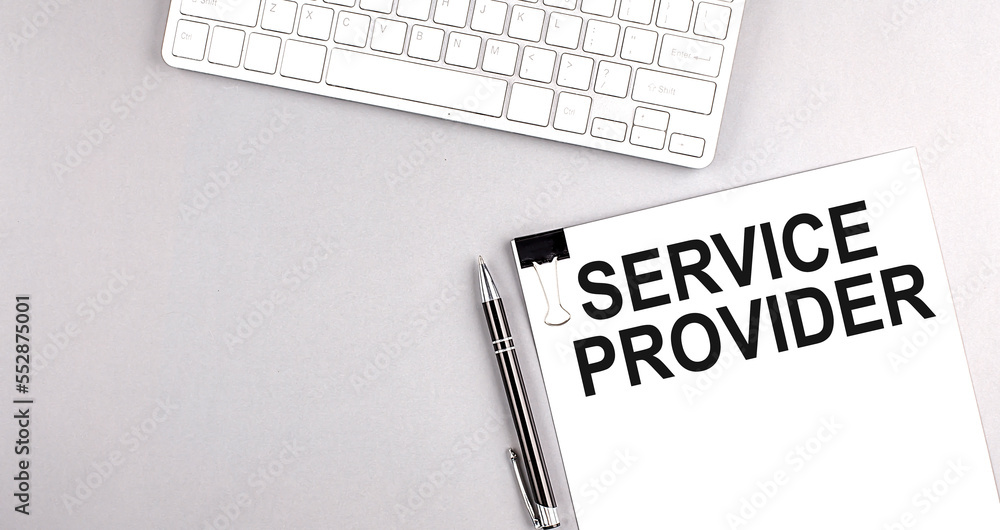 Poster service provider text on paper with keyboard on grey background